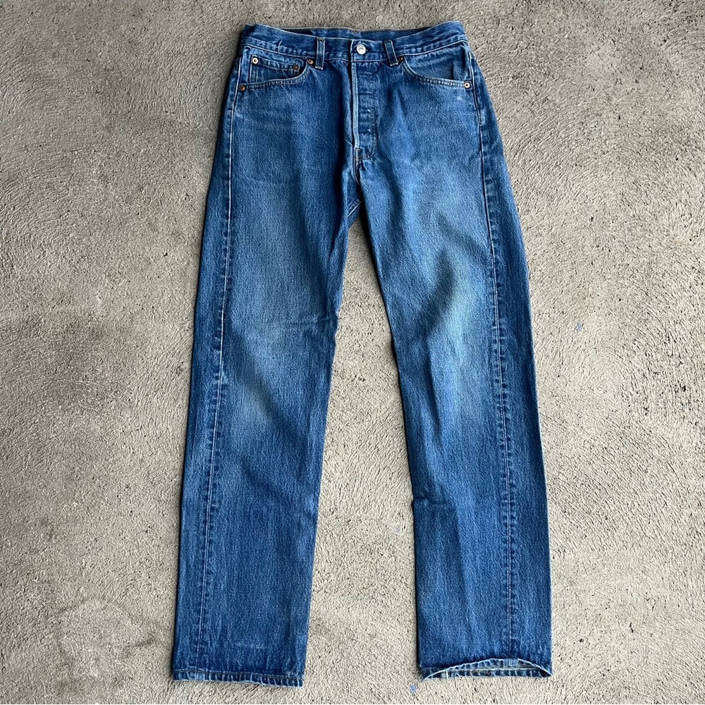 Dark-wash Levi’s 501 jeans